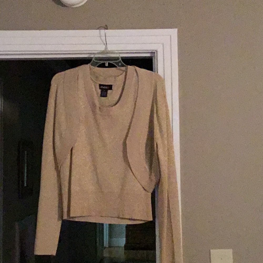 Sleeveless top with matching shrug-type sweater